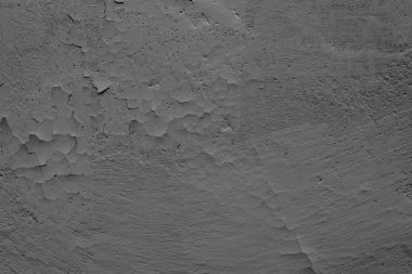 Çatlakları ve çizikleri olan beton bir duvarın dokusu arka plan olarak kullanılabilir.
