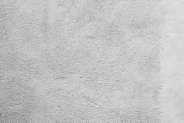 Çatlakları ve çizikleri olan beton bir duvarın dokusu arka plan olarak kullanılabilir.