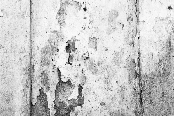 Textura de una pared de hormigón con grietas y arañazos que se pueden utilizar como fondo —  Fotos de Stock