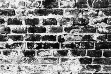 Çatlakları ve çizikleri olan tuğla duvar dokusu arka plan olarak kullanılabilir.