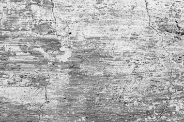 Çatlakları ve çizikleri olan beton bir duvarın dokusu arka plan olarak kullanılabilir.