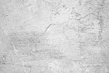 Çatlakları ve çizikleri olan beton bir duvarın dokusu arka plan olarak kullanılabilir.