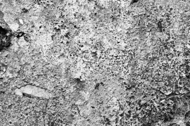 Çatlakları ve çizikleri olan beton bir duvarın dokusu arka plan olarak kullanılabilir.