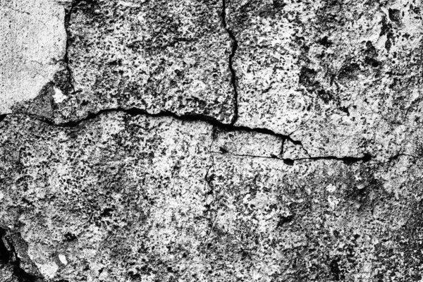 Textura de uma parede de concreto com fendas e arranhões que podem usar-se como um contexto — Fotografia de Stock