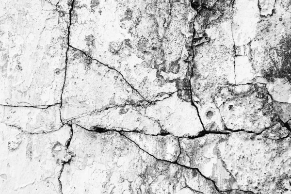 Текстура бетонной стены с трещинами и царапинами, которые могут быть использованы в качестве фона — стоковое фото
