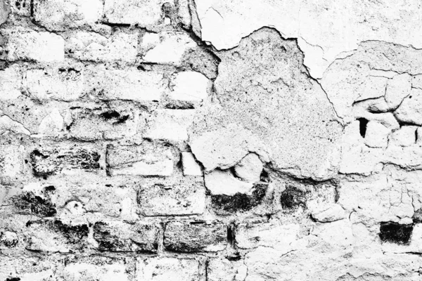 Texture of a brick wall with cracks and scratches which can be used as a background — Stock Photo, Image