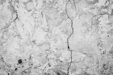 Çatlakları ve çizikleri olan beton bir duvarın dokusu arka plan olarak kullanılabilir.