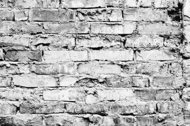 Çatlakları ve çizikleri olan tuğla duvar dokusu arka plan olarak kullanılabilir.