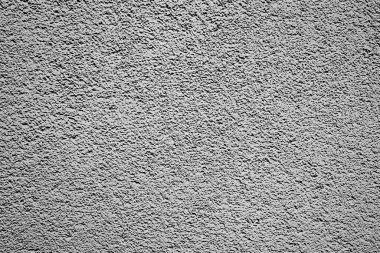 Çatlakları ve çizikleri olan beton bir duvarın dokusu arka plan olarak kullanılabilir.