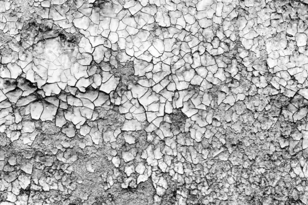 Texture d'un mur en béton avec des fissures et des rayures qui peuvent être utilisées comme fond — Photo