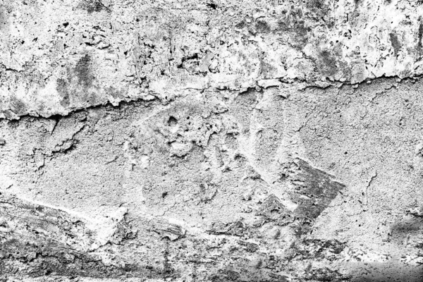 Texture d'un mur en béton avec des fissures et des rayures qui peuvent être utilisées comme fond — Photo