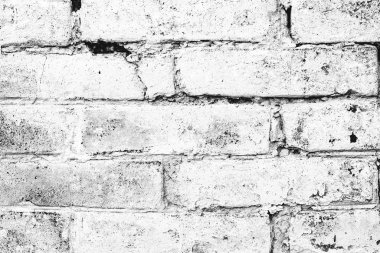 Çatlakları ve çizikleri olan tuğla duvar dokusu arka plan olarak kullanılabilir.