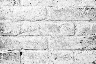 Çatlakları ve çizikleri olan tuğla duvar dokusu arka plan olarak kullanılabilir.