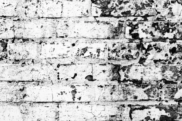 Texture of a brick wall with cracks and scratches which can be used as a background — Stock Photo, Image