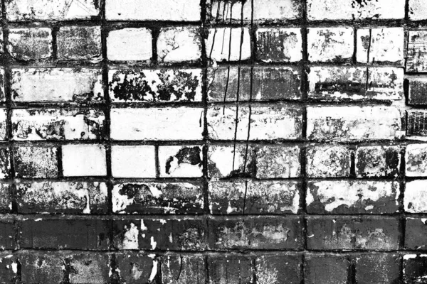 Texture of a brick wall with cracks and scratches which can be used as a background — Stock Photo, Image