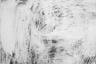 Çatlakları ve çizikleri olan beton bir duvarın dokusu arka plan olarak kullanılabilir.