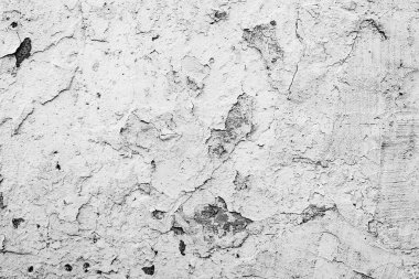 Çatlakları ve çizikleri olan beton bir duvarın dokusu arka plan olarak kullanılabilir.