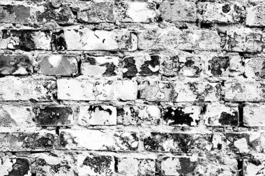 Çatlakları ve çizikleri olan tuğla duvar dokusu arka plan olarak kullanılabilir.