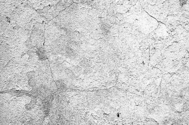 Çatlakları ve çizikleri olan beton bir duvarın dokusu arka plan olarak kullanılabilir.