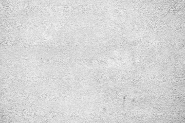 Çatlakları ve çizikleri olan beton bir duvarın dokusu arka plan olarak kullanılabilir.