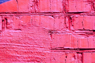 Çatlakları ve çizikleri olan tuğla duvar dokusu arka plan olarak kullanılabilir.