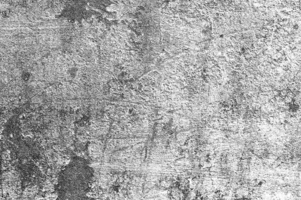 Faktura betonowej ściany z pęknięciami i zadrapaniami, które mogą być wykorzystane jako tło — Zdjęcie stockowe