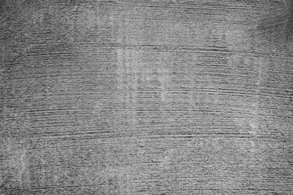 பின்னணியாகப் பயன்படுத்தக்கூடிய துளைகள் மற்றும் கீறல்களுடன் ஒரு கான்கிரீட் சுவரின் அமைப்பு — ஸ்டாக் புகைப்படம்