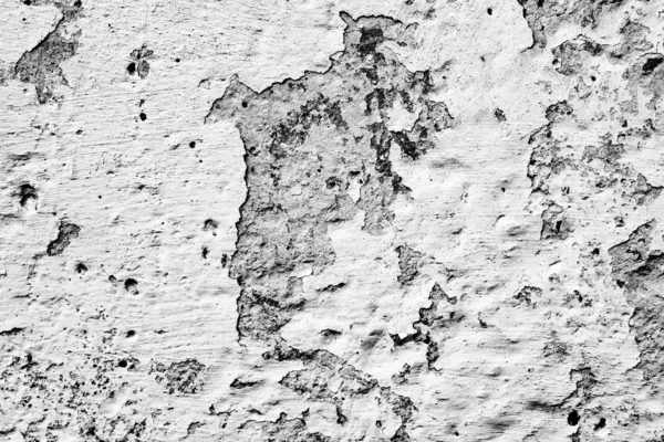 Texture d'un mur en béton avec des fissures et des rayures qui peuvent être utilisées comme fond — Photo