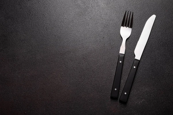Set of tableware ready for the meal with black copy space — Stock Image Set of tableware ready for the meal with black copy space Stock Image