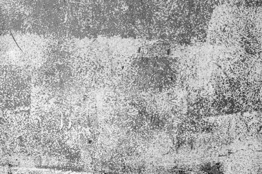 Çatlakları ve çizikleri olan metal bir duvarın dokusu arka plan olarak kullanılabilir.