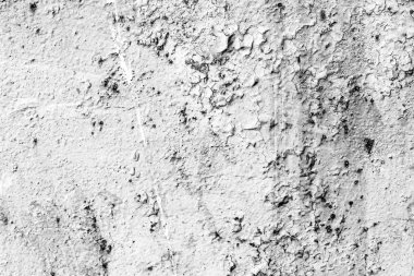 Çatlakları ve çizikleri olan metal bir duvarın dokusu arka plan olarak kullanılabilir.