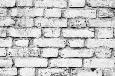 Çatlakları ve çizikleri olan tuğla duvar dokusu arka plan olarak kullanılabilir.