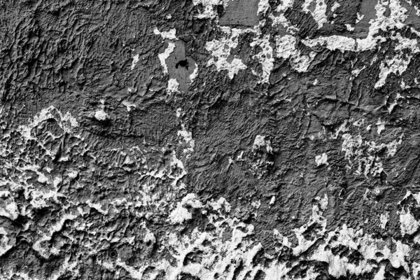 текстура бетонной стены с трещинами и царапинами, которые могут быть использованы в качестве фона