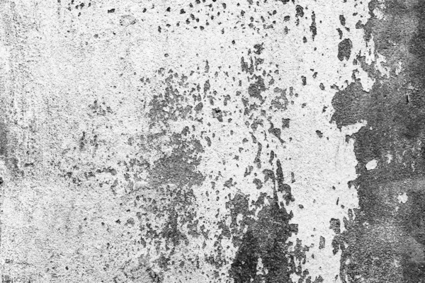 Faktura betonowej ściany z pęknięciami i zadrapaniami, które mogą być wykorzystane jako tło — Zdjęcie stockowe