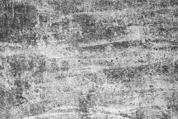 Textuur van een betonnen wand met scheuren en krassen die als achtergrond kunnen worden gebruikt — Stockfoto
