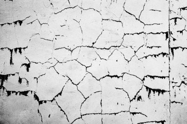 Çatlakları ve çizikleri olan beton bir duvarın dokusu arka plan olarak kullanılabilir.