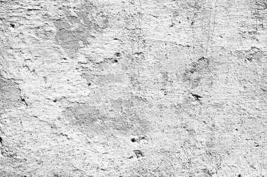 Çatlakları ve çizikleri olan beton bir duvarın dokusu arka plan olarak kullanılabilir.