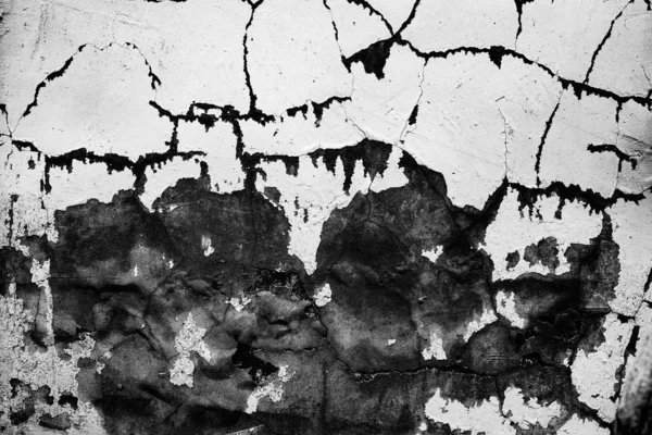 Texture d'un mur en béton avec des fissures et des rayures qui peuvent être utilisées comme fond — Photo