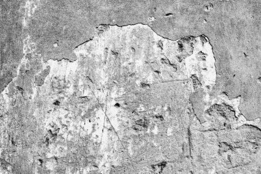 Çatlakları ve çizikleri olan beton bir duvarın dokusu arka plan olarak kullanılabilir.