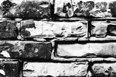 Çatlakları ve çizikleri olan tuğla duvar dokusu arka plan olarak kullanılabilir.