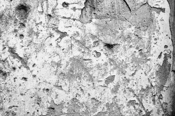 Textura de uma parede de concreto com fendas e arranhões que podem usar-se como um contexto — Fotografia de Stock