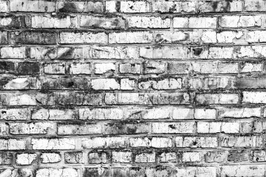 Çatlakları ve çizikleri olan tuğla duvar dokusu arka plan olarak kullanılabilir.