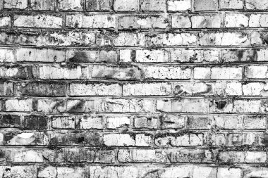 Çatlakları ve çizikleri olan tuğla duvar dokusu arka plan olarak kullanılabilir.