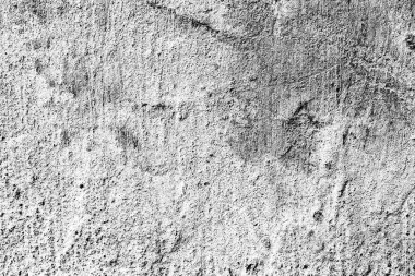 Çatlakları ve çizikleri olan beton bir duvarın dokusu arka plan olarak kullanılabilir.