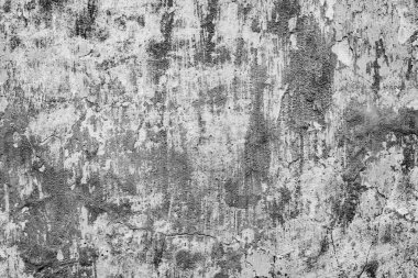 Çatlakları ve çizikleri olan beton bir duvarın dokusu arka plan olarak kullanılabilir.