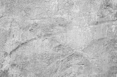 Çatlakları ve çizikleri olan beton bir duvarın dokusu arka plan olarak kullanılabilir.