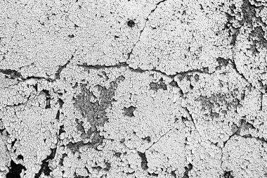 Çatlakları ve çizikleri olan beton bir duvarın dokusu arka plan olarak kullanılabilir.