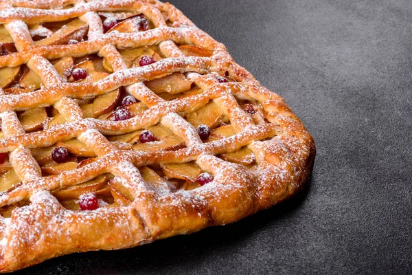 Delicious fresh pie baked with apple, pears and berries. Fresh pastries for delicious breakfast