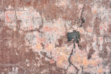 Çatlakları ve çizikleri olan beton bir duvarın dokusu arka plan olarak kullanılabilir.