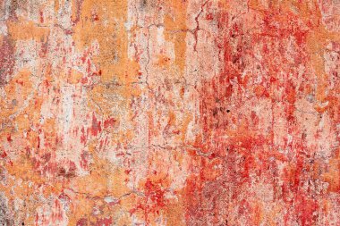 Çatlakları ve çizikleri olan beton bir duvarın dokusu arka plan olarak kullanılabilir.